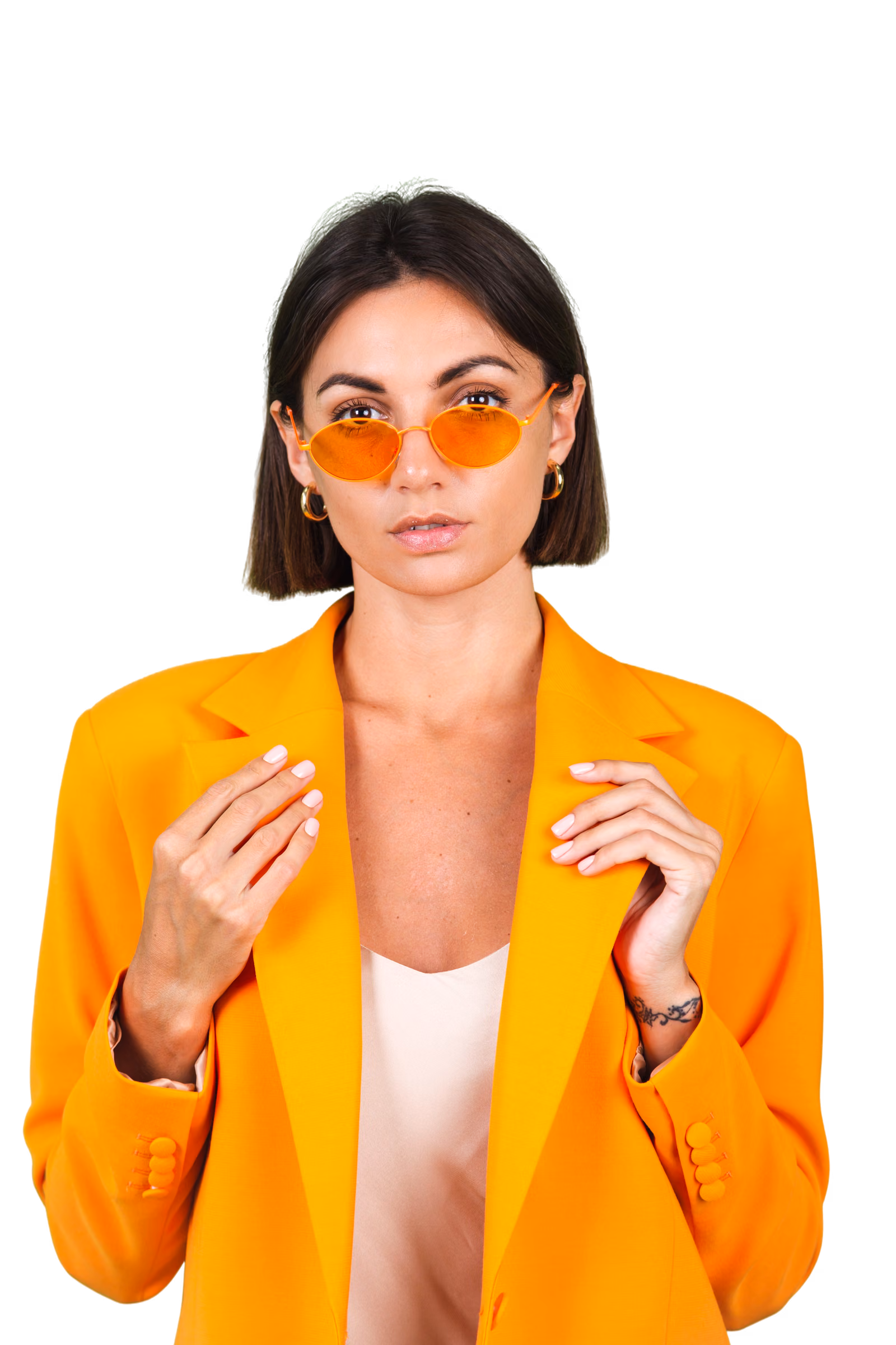 Ines Duarte, this week’s cover, in a long coat against the lime cover